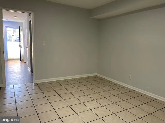 a view of a backyard with a car parked in it