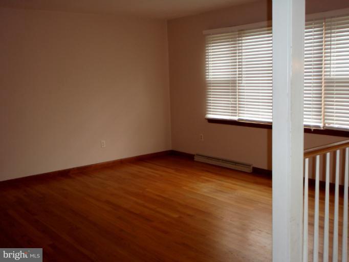 43594 Hay Road Ashburn, VA 20147 - Photo 5 of 16 a view of an empty room with a window