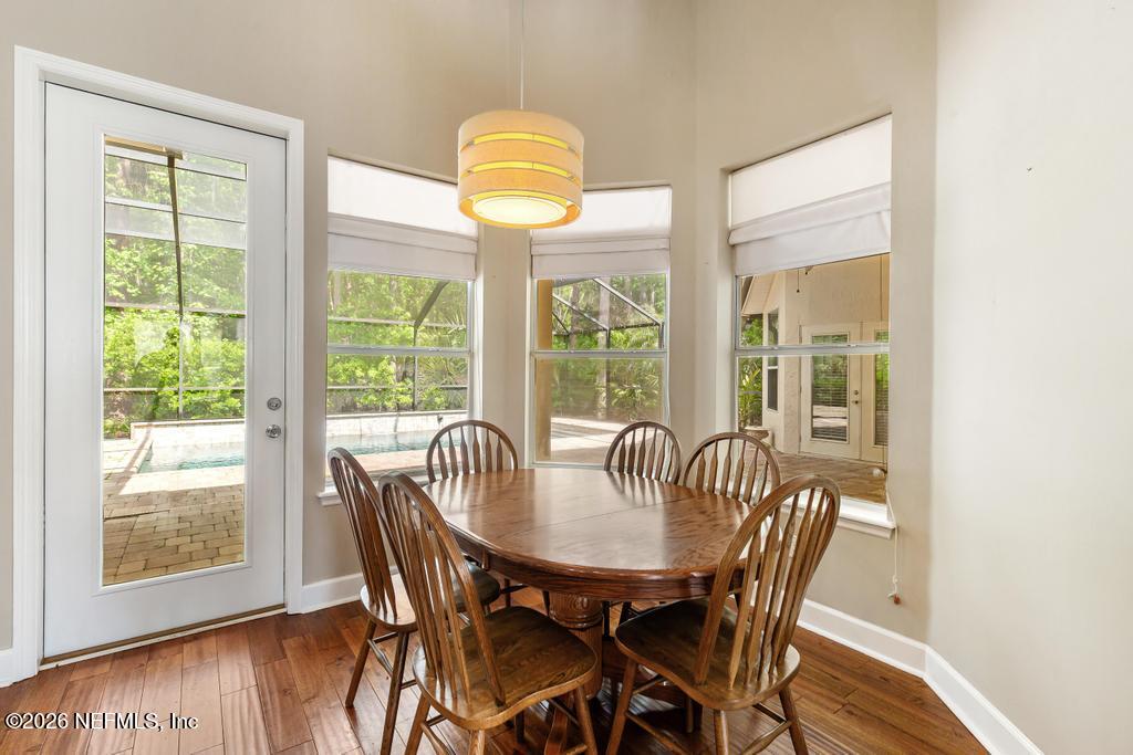 337 South Mill View Way Ponte Vedra Beach, FL 32082 - Photo 27 of 63 a view of a dining room with furniture window and wooden floor