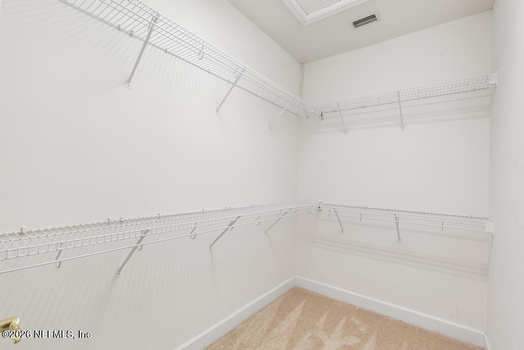 337 South Mill View Way Ponte Vedra Beach, FL 32082 - Photo 30 of 63 a view of a room with racks on the wall