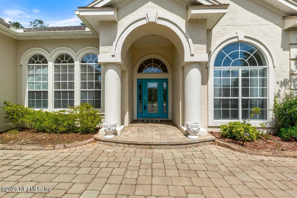 337 South Mill View Way Ponte Vedra Beach, FL 32082 - Photo 3 of 63 a front view of a house with garden