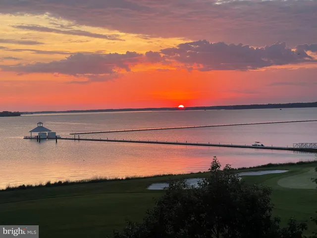 a view of an ocean and a yard