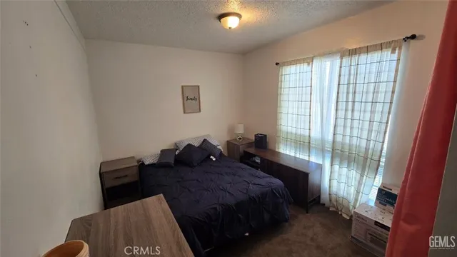 a bathroom with a sink a toilet and vanity