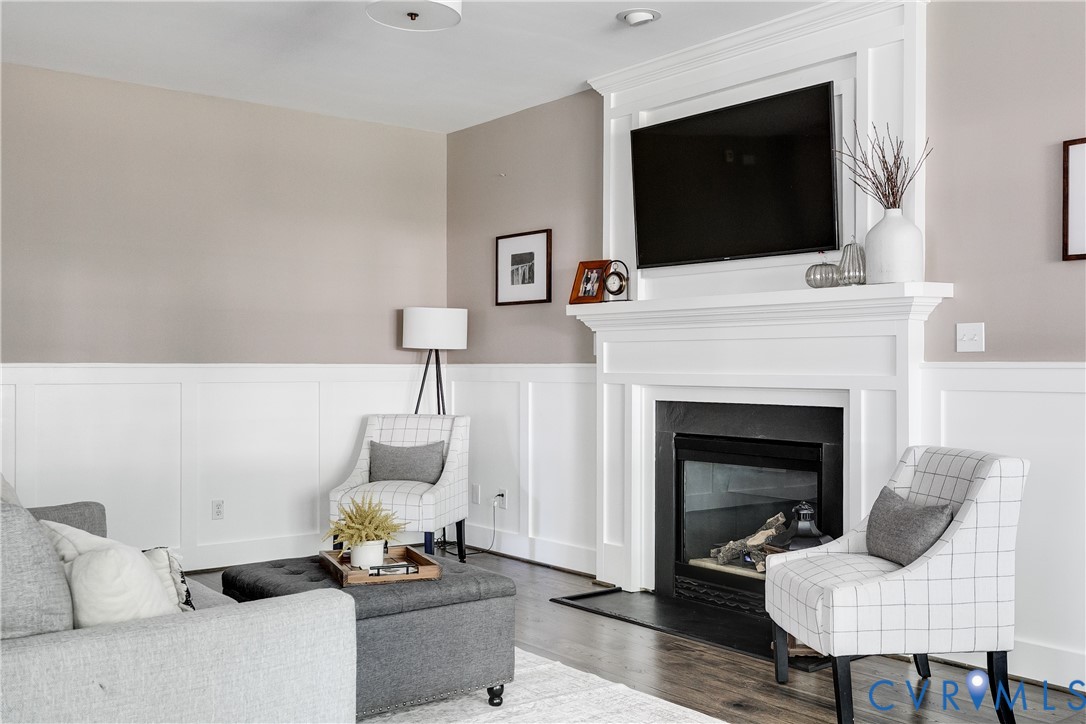 806 Biggin Pond Road Midlothian, VA 23114 - Photo 23 of 50 a living room with furniture and a fireplace