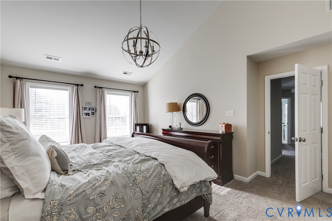 806 Biggin Pond Road Midlothian, VA 23114 - Photo 35 of 50 a bedroom with a bed and window