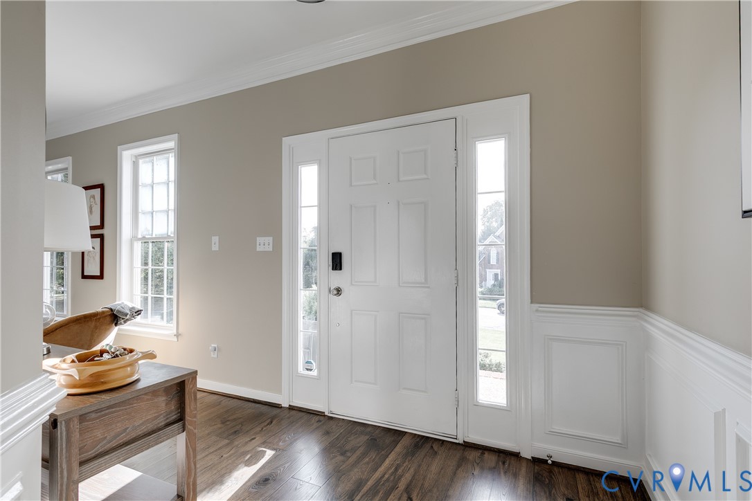 806 Biggin Pond Road Midlothian, VA 23114 - Photo 5 of 50 a view of a workspace with wooden floor and bathroom