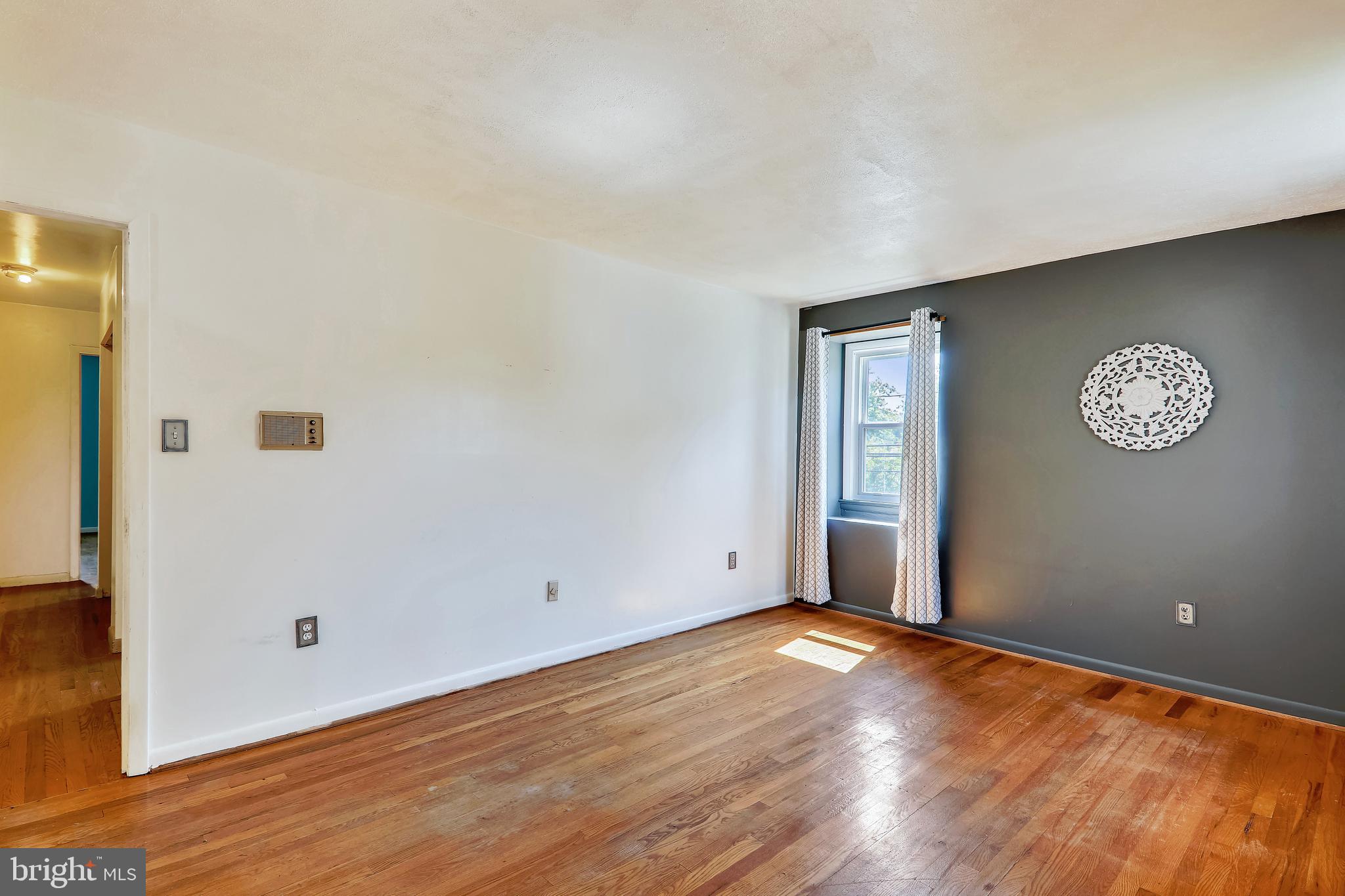 16108 Kent Road Laurel, MD 20707 - Photo 31 of 54 WOOD FLOORING & FRONT & SIDE WINDOWS