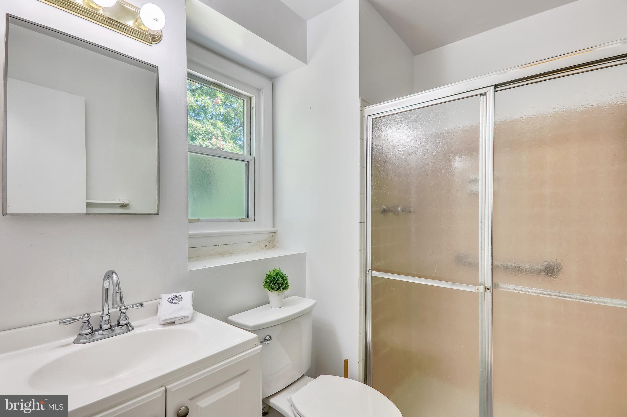 16108 Kent Road Laurel, MD 20707 - Photo 35 of 54 OWNER'S BATHROOM WITH WALK-IN SHOWER