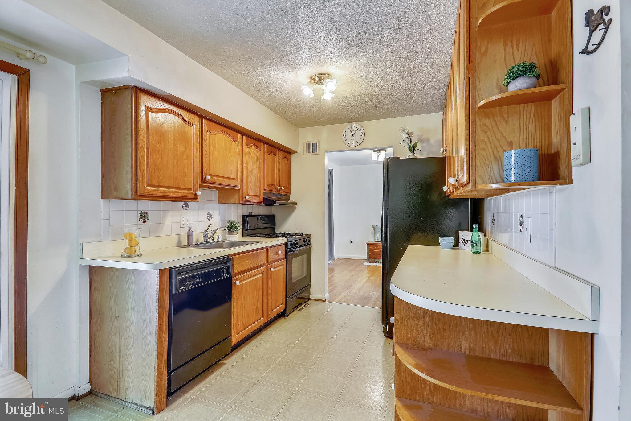 16108 Kent Road Laurel, MD 20707 - Photo 10 of 54 KITCHEN WITH VINYL FLOORING