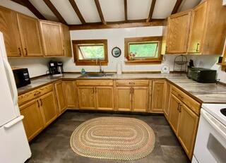 75 Skoglund Road Mount Vernon, ME 04352 - Photo 11 of 31 Lodge kitchen