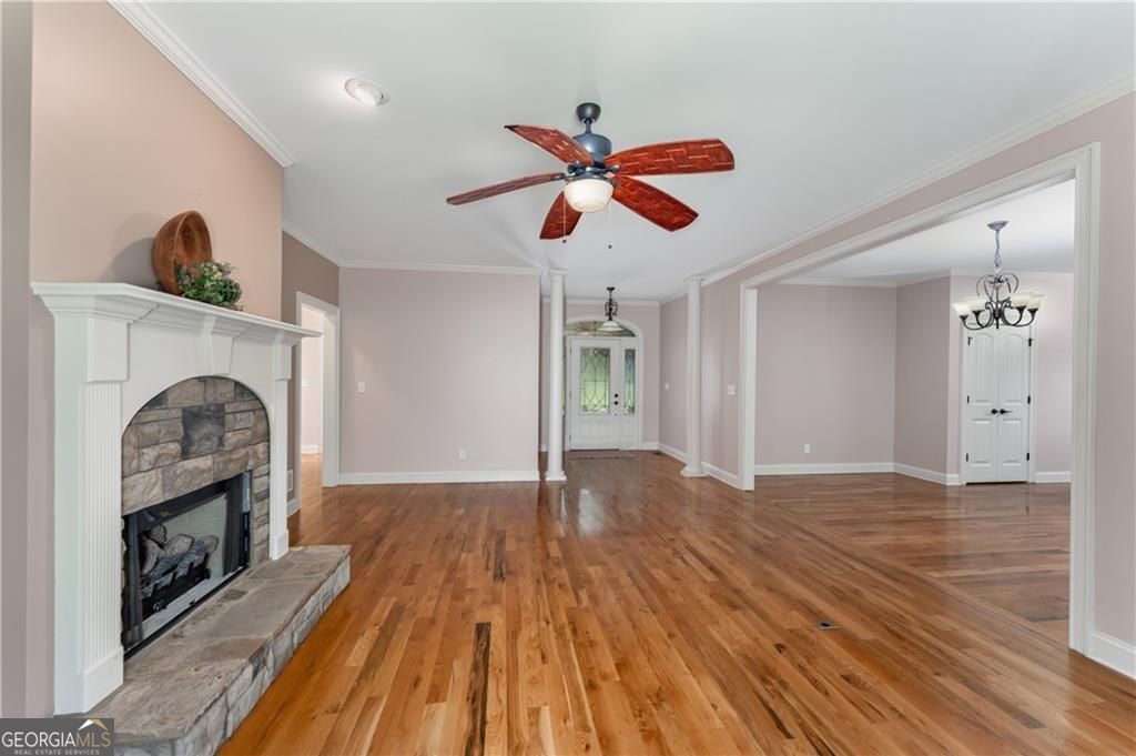 1158 Bailey Road Aragon, GA 30104 - Photo 8 of 73 a view of empty room with wooden floor and fan