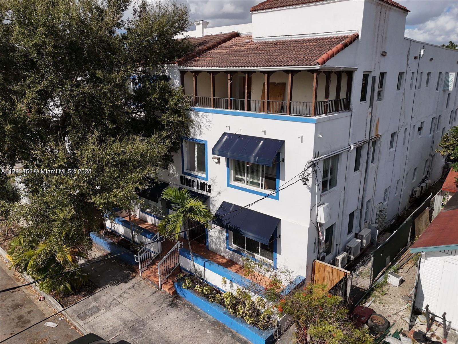 1021 Northwest 3rd Street, Unit 305 Miami, FL 33128 - Photo 1 of 22 a view of outdoor space and yard