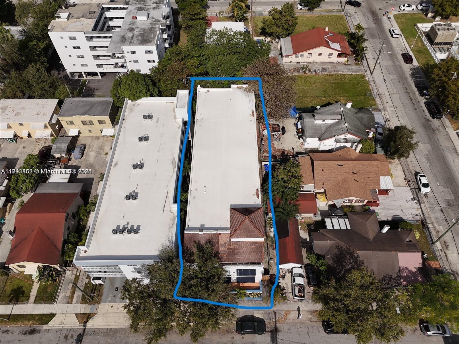 1021 Northwest 3rd Street, Unit 305 Miami, FL 33128 - Photo 5 of 22 an aerial view of residential houses with outdoor space