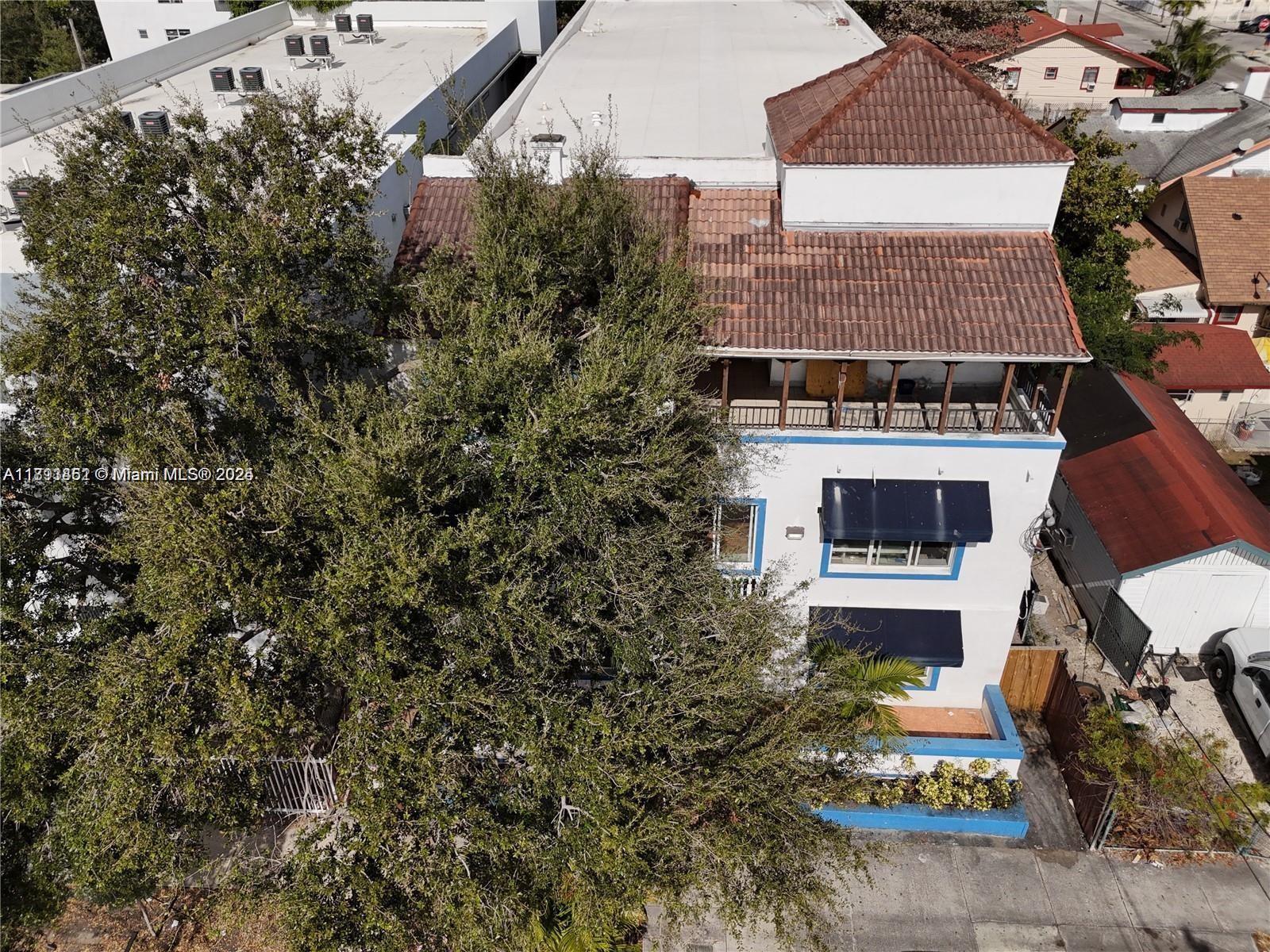 1021 Northwest 3rd Street, Unit 305 Miami, FL 33128 - Photo 9 of 22 an aerial view of a house