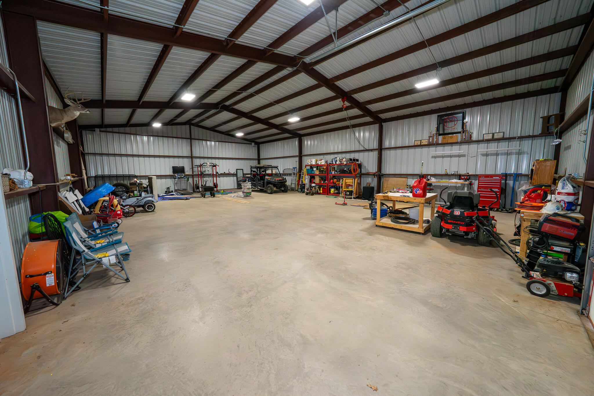 3301 County Road 7560 Lubbock, TX 79423 - Photo 37 of 40 a view of a garage with cars
