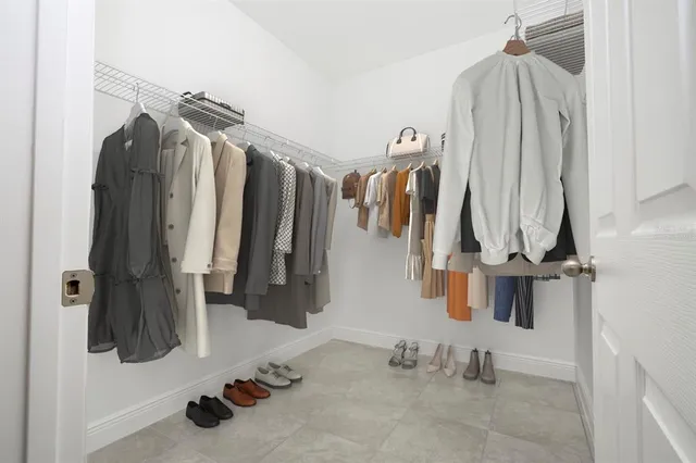 a bathroom with a toilet and a bathtub