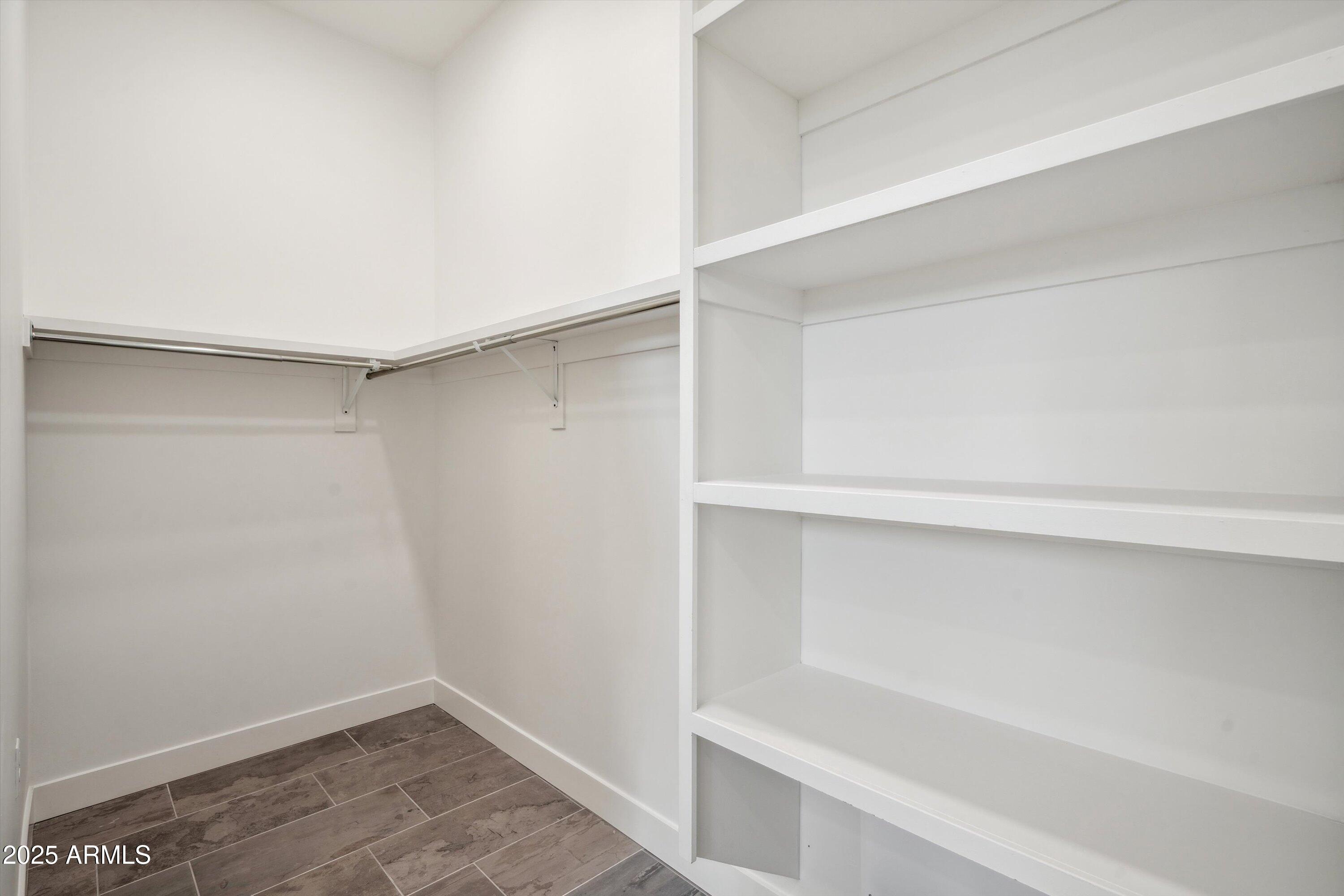 1501 North Miller Road, Unit 1009 Scottsdale, AZ 85257 - Photo 22 of 46 19-Master Bedroom Closet