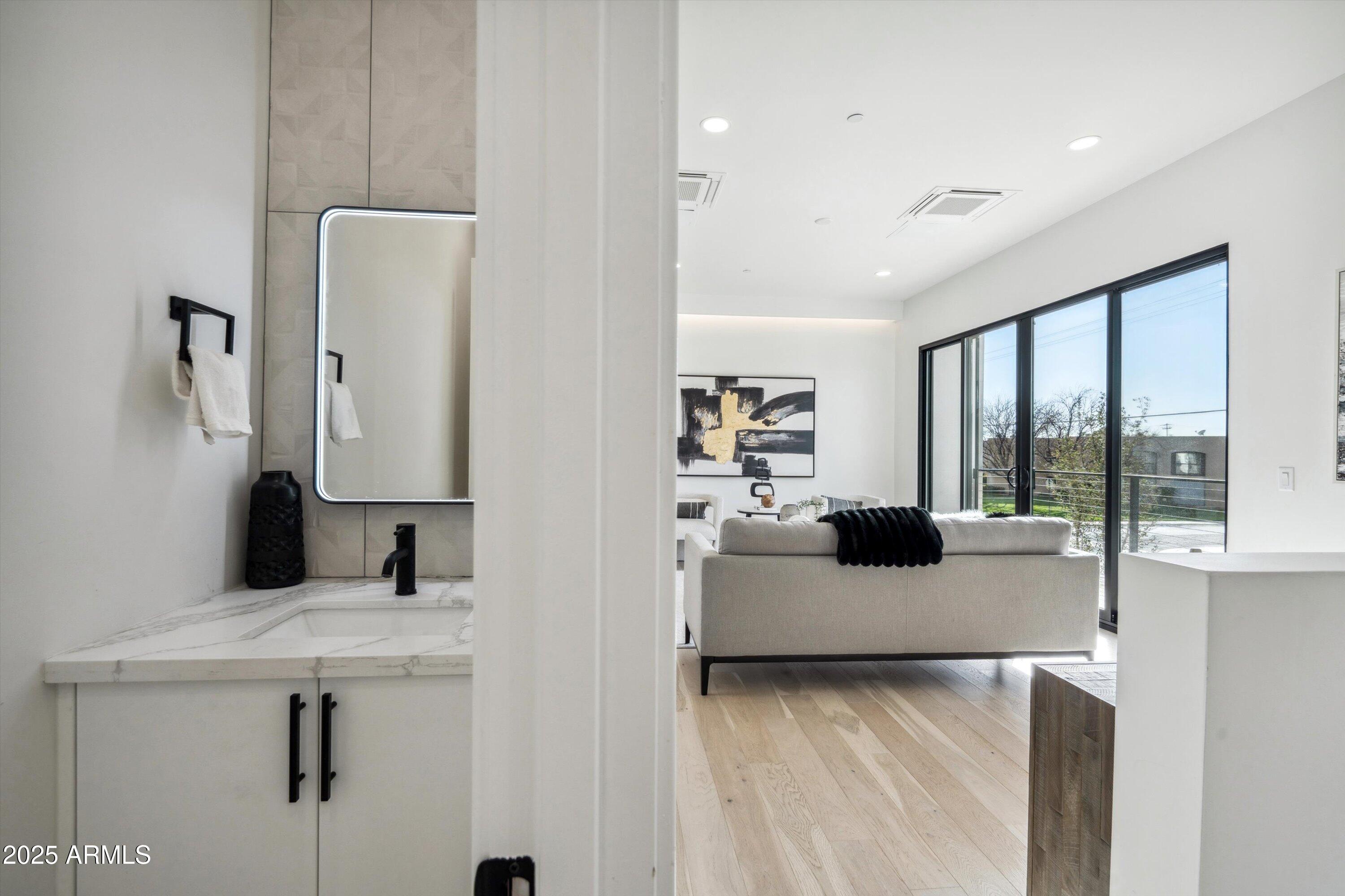 1501 North Miller Road, Unit 1009 Scottsdale, AZ 85257 - Photo 30 of 46 27-Powder Room to Living Room