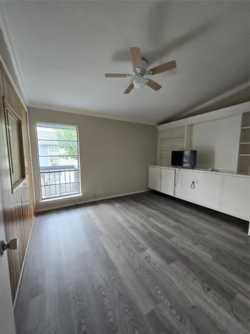 a kitchen with stainless steel appliances a refrigerator sink and cabinets