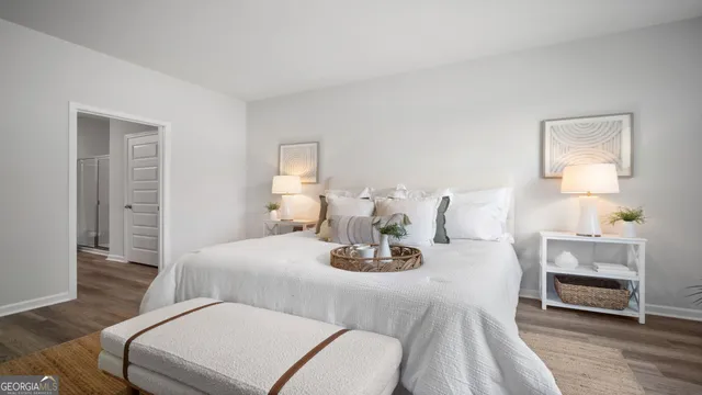 a bedroom with a bed and a fireplace