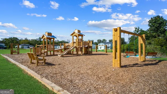 a view of a park with swings