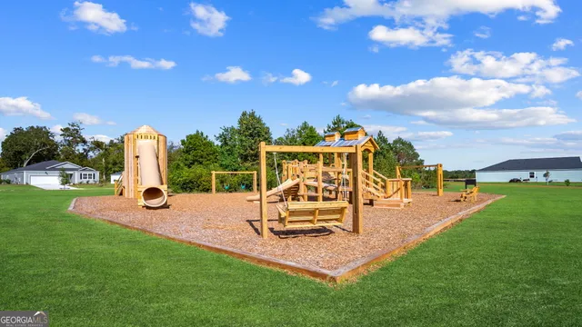 a view of a park with slide