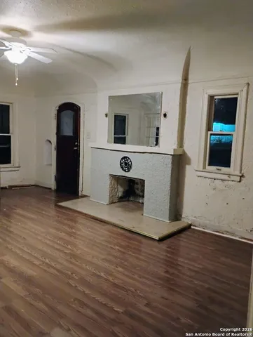 a view of living room with furniture and flat screen tv