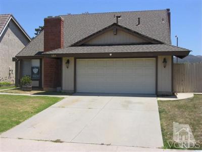 284 Mariposa Drive Camarillo, CA 93012 - Photo 1 of 16 a front view of a house with garden