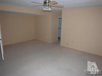 284 Mariposa Drive Camarillo, CA 93012 - Photo 6 of 16 an empty room with a chandelier fan