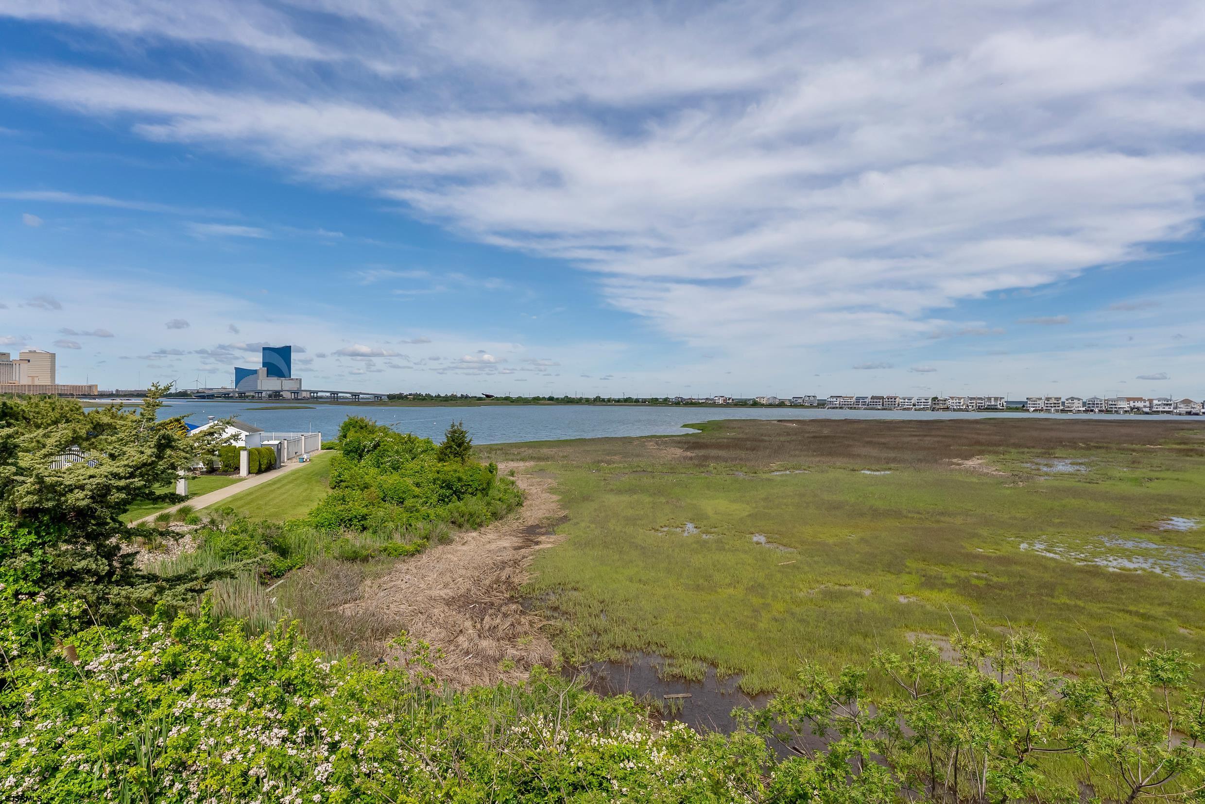 13 Delmar Drive, Unit 13 Brigantine, NJ 08203 - Photo 94 of 98 a view of an ocean and beach