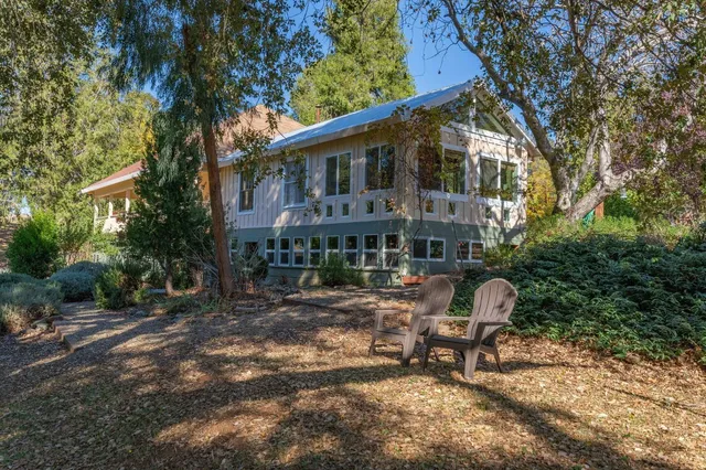a bedroom with a bed and a mirror