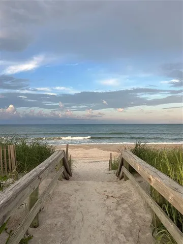 a view of an ocean with beach