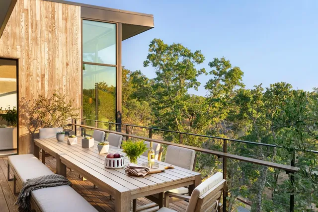 a outdoor living space with furniture and a potted plant