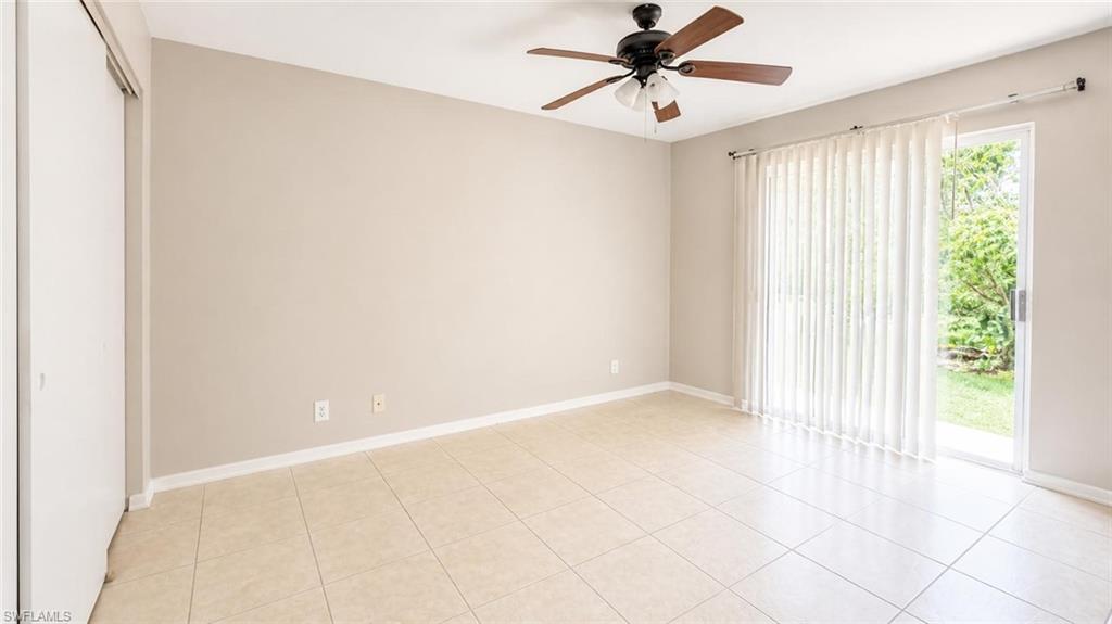 5410 16th Place Southwest, Unit B1 Naples, FL 34116 - Photo 13 of 26 a view of an empty room with a window