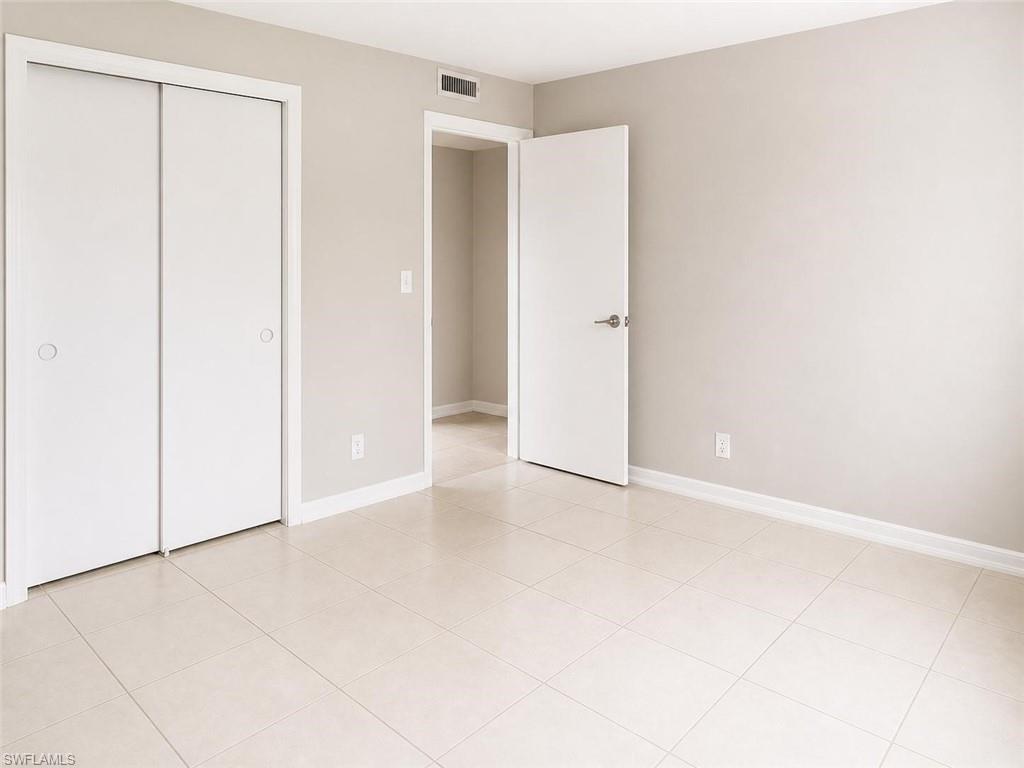 5410 16th Place Southwest, Unit B1 Naples, FL 34116 - Photo 14 of 26 a view of an empty room