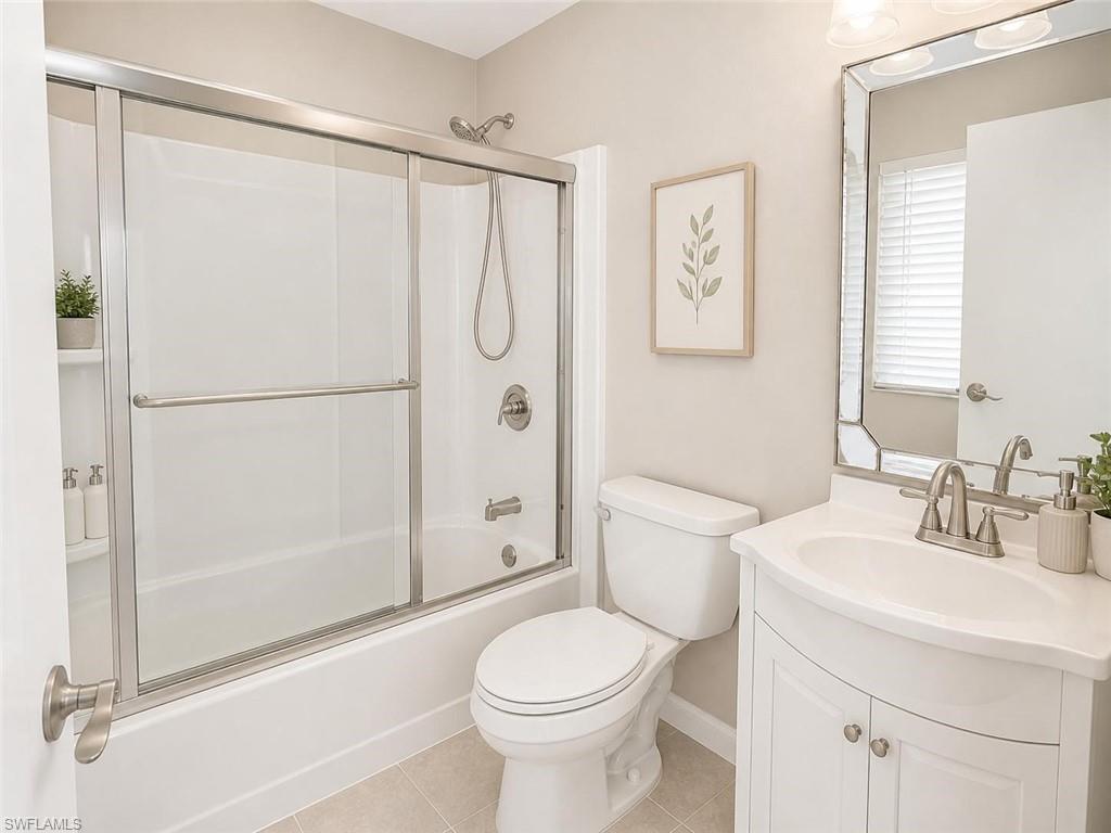 5410 16th Place Southwest, Unit B1 Naples, FL 34116 - Photo 15 of 26 a bathroom with a sink toilet and shower