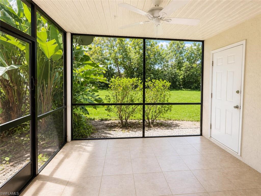 5410 16th Place Southwest, Unit B1 Naples, FL 34116 - Photo 22 of 26 a view of a garden with an outdoor seating