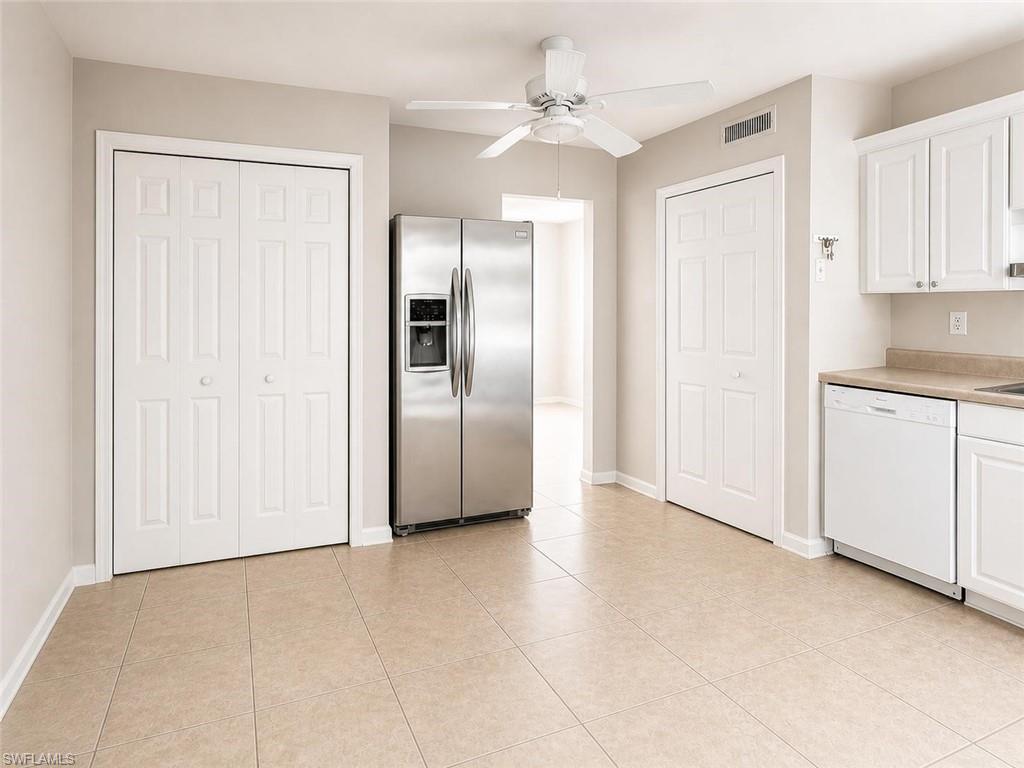 5410 16th Place Southwest, Unit B1 Naples, FL 34116 - Photo 8 of 26 a view of a kitchen with a sink and cabinet area