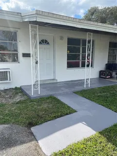 a house with yard in front of it