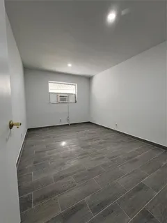 an empty room with a natural light