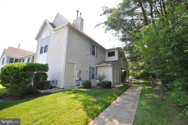 a front view of house with yard
