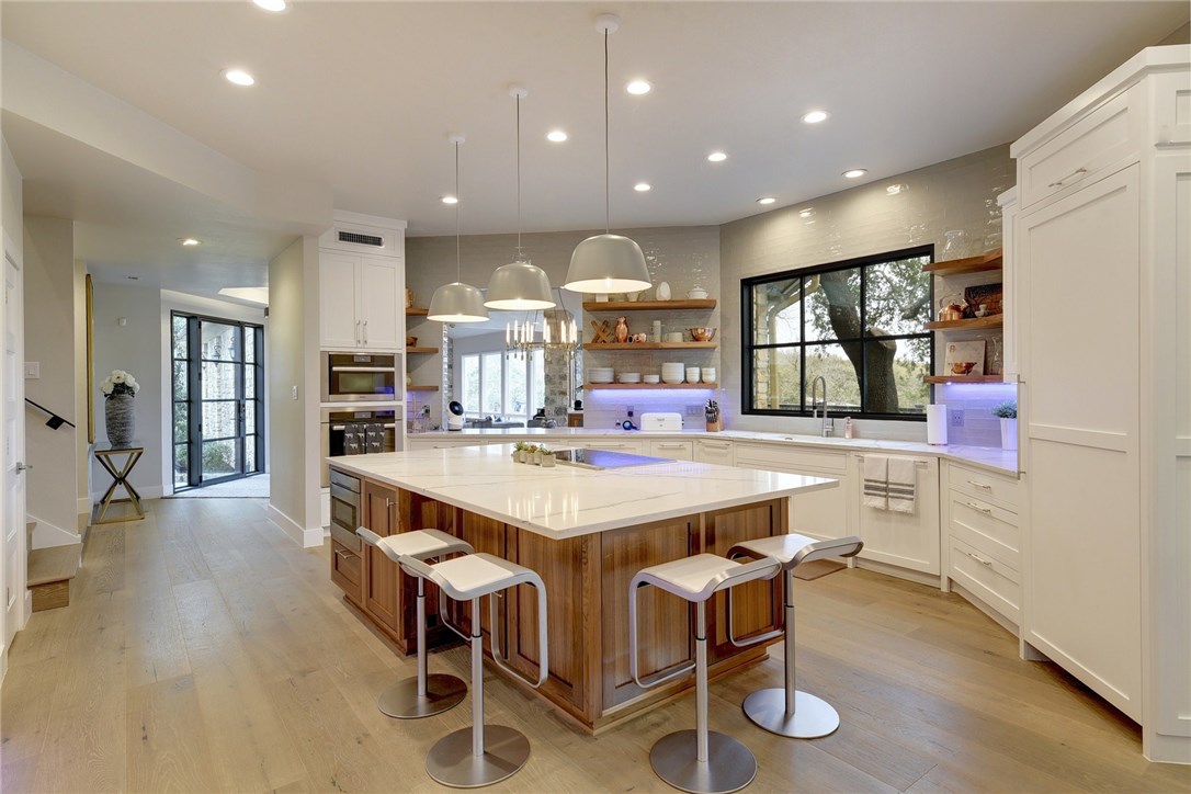 9503 Ashton Ridge Austin, TX 78750 - Photo 1 of 1 Gorgeous dream kitchen with the perfect blend of stone, wood, metal, and glass.