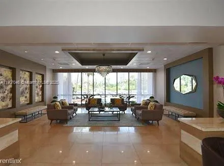 a living room with furniture large window and flat screen tv