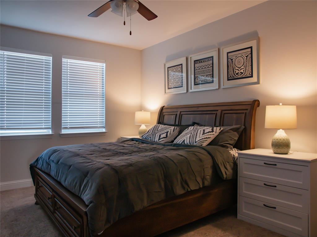 2000 Naples Drive Rowlett, TX 75088 - Photo 15 of 21 a bedroom with a bed and a window