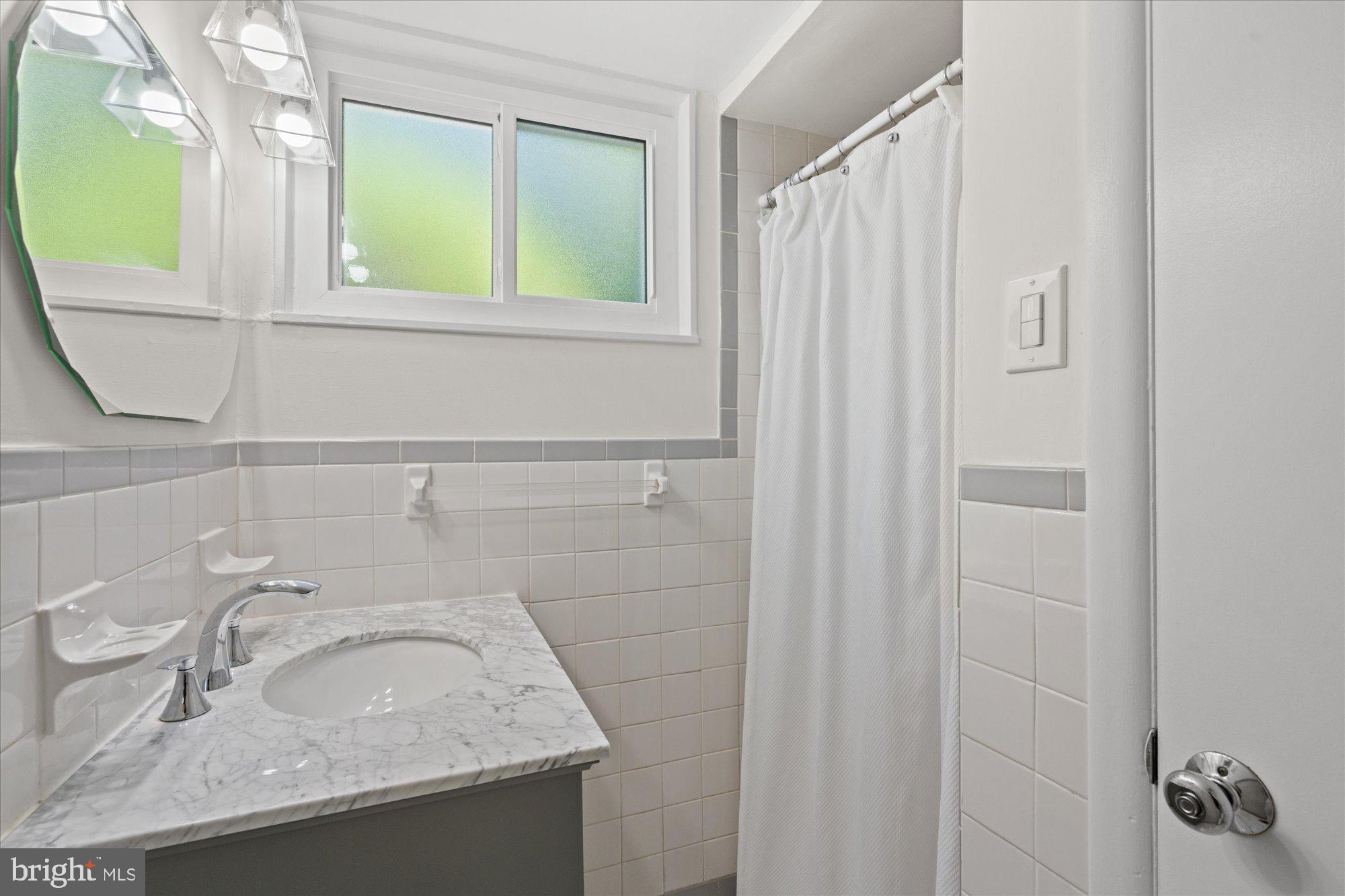 2317 Ross Road Silver Spring, MD 20910 - Photo 7 of 28 Full bath on main level