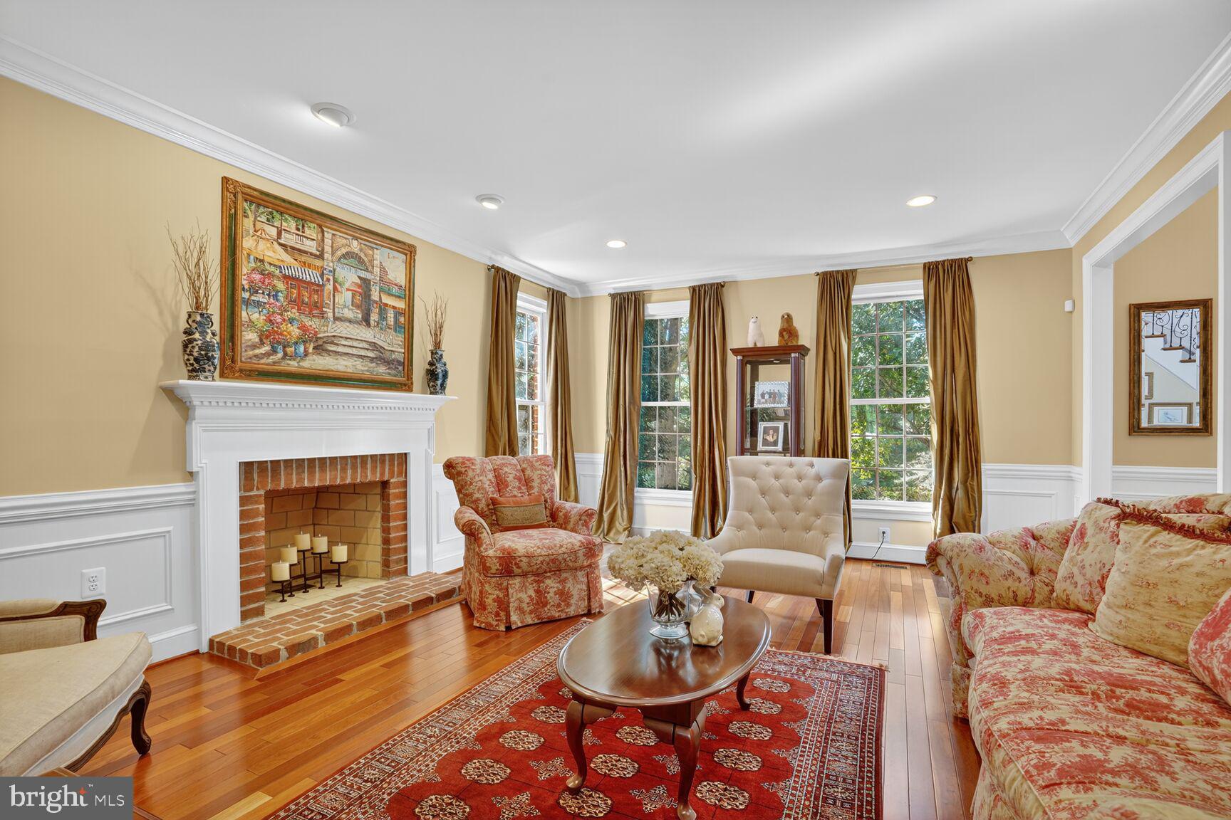 6705 Cedar View Court Clifton, VA 20124 - Photo 11 of 72 a living room with furniture and a fireplace