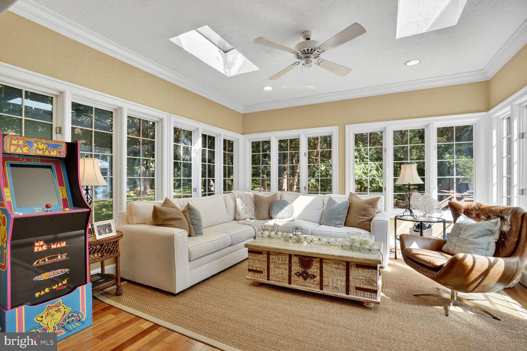 6705 Cedar View Court Clifton, VA 20124 - Photo 21 of 72 a living room with furniture and a flat screen tv