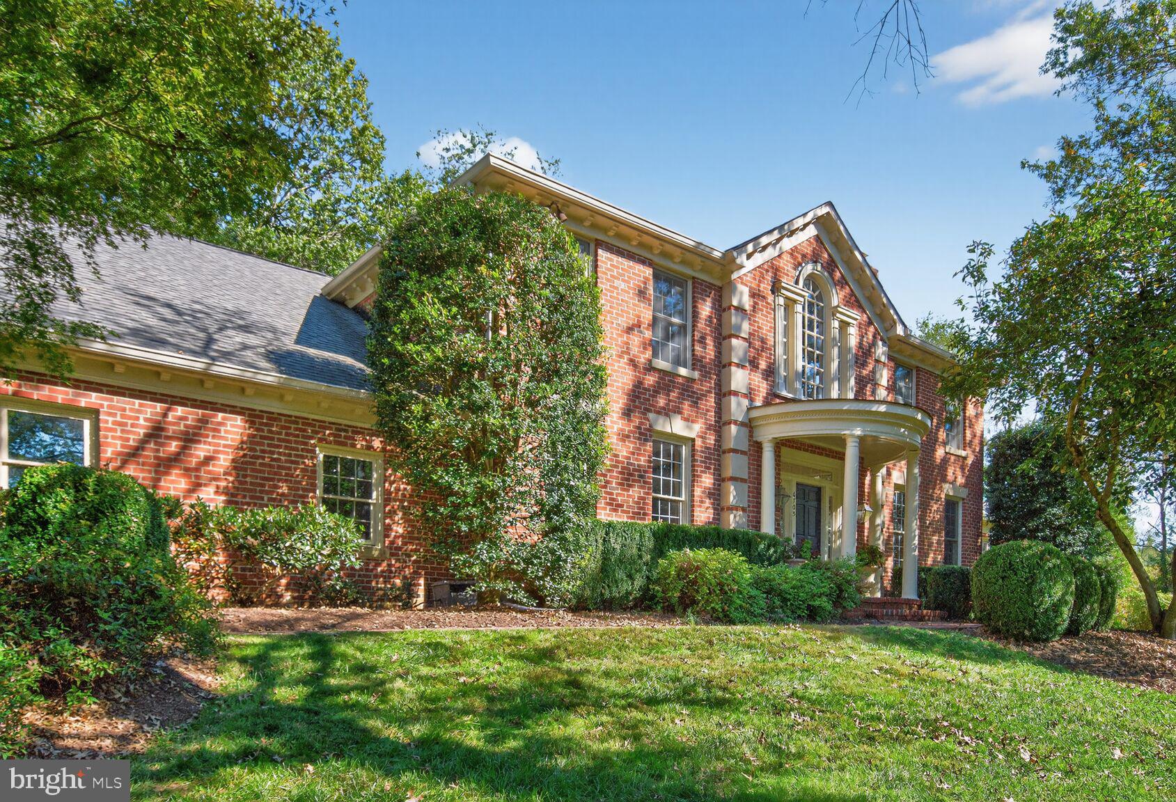 6705 Cedar View Court Clifton, VA 20124 - Photo 3 of 72 a front view of a house with a yard