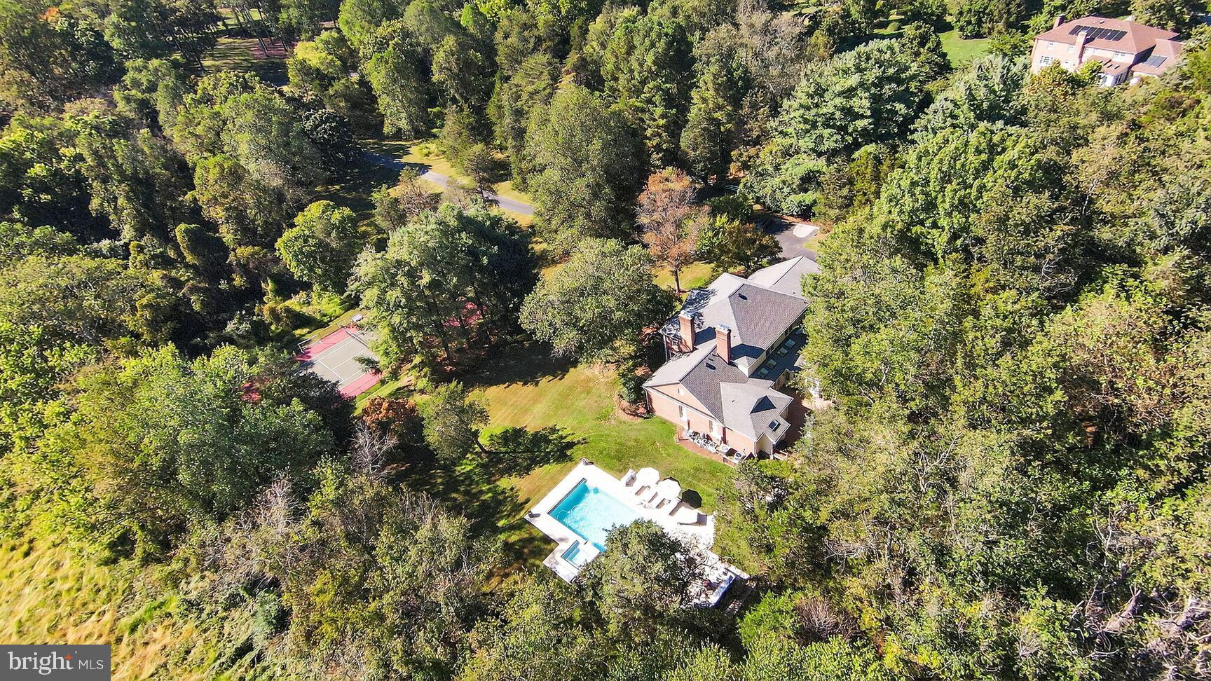 6705 Cedar View Court Clifton, VA 20124 - Photo 37 of 72 a backyard of a house with lots of green space