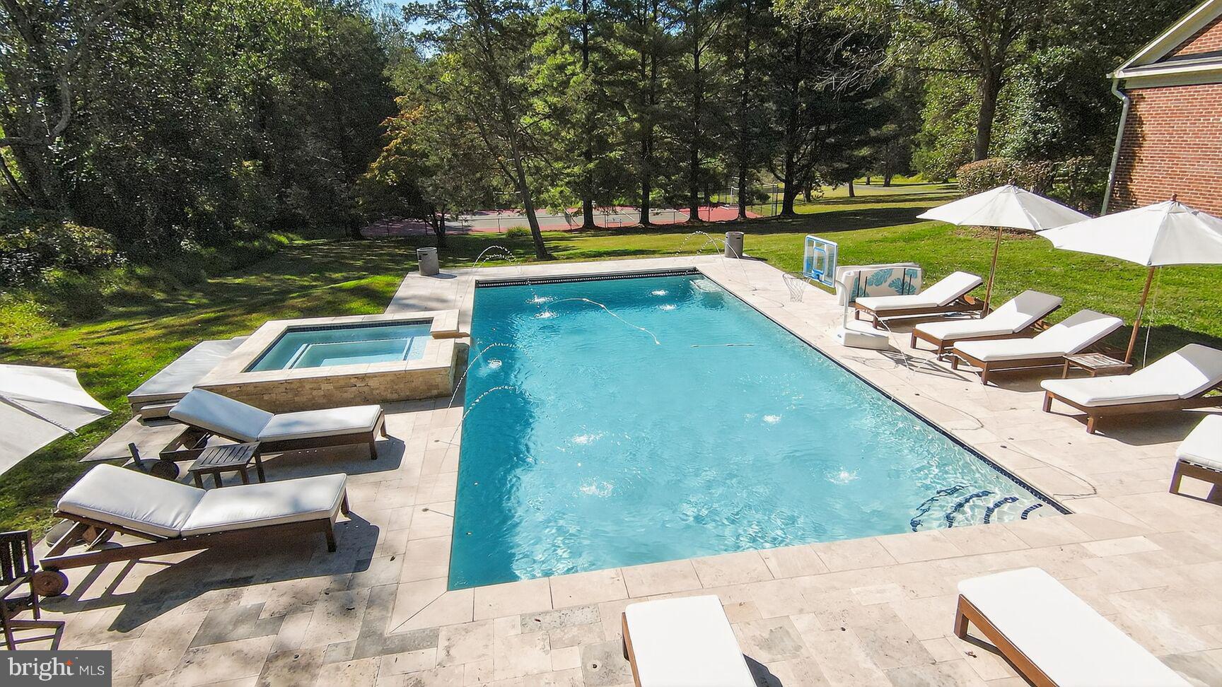 6705 Cedar View Court Clifton, VA 20124 - Photo 39 of 72 a view of a swimming pool with a patio